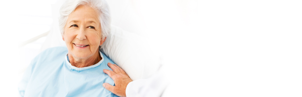 Elderly woman in hospital bed