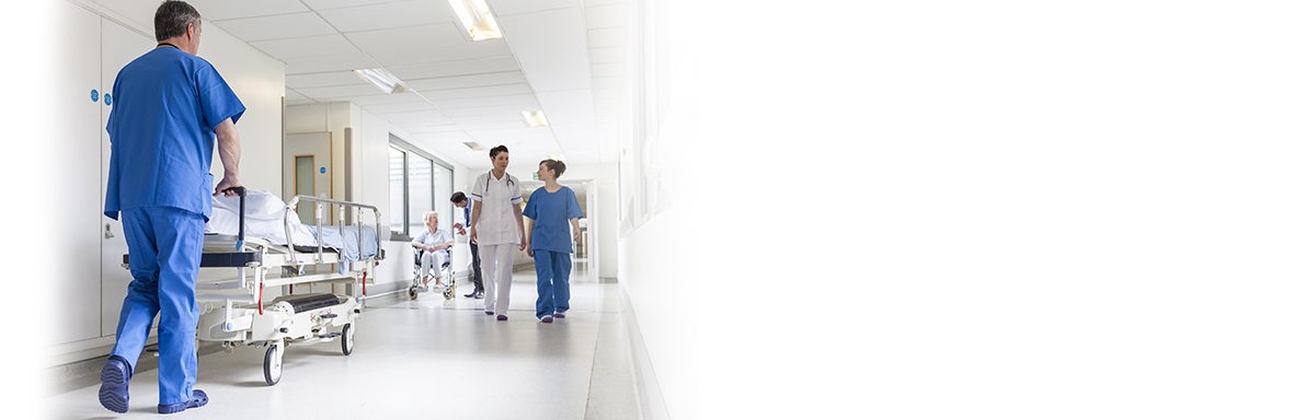 Doctors and nurses in hospital hallway